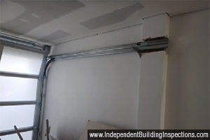 Building inspection shows dangerous installation of door brackets
