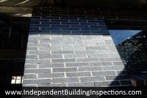 building stage inspections found defective brickwork